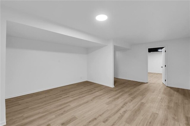 220 NE Dreamweaver Ave, Lees Summit, MO 64086 - finished basement featuring wood finished floors and baseboards
