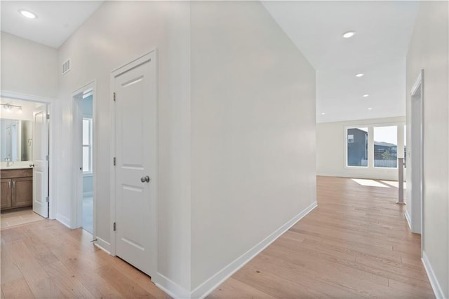 16767 S Hall St, Olathe, KS 66062 - hall featuring light wood-style floors and baseboards