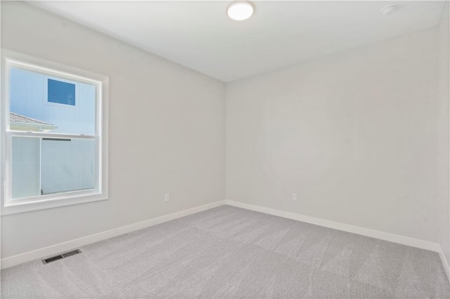16767 S Hall St, Olathe, KS 66062 - carpeted spare room with baseboards and a smoke detector