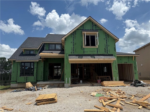 18501 Mohawk Ln, Overland Park, KS 66085 - rear view of house featuring roof with shingles