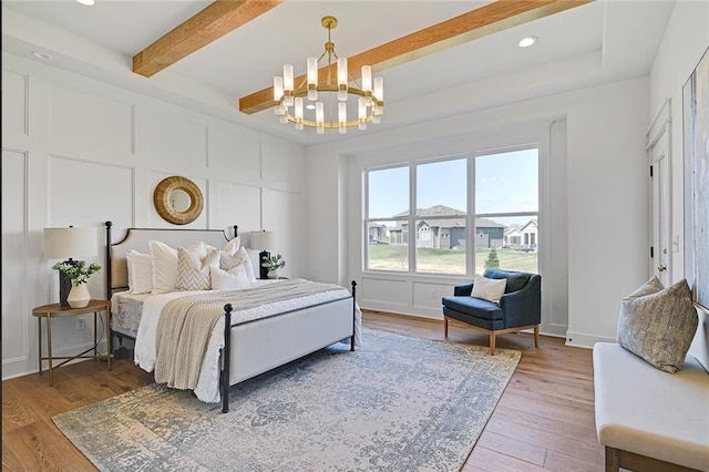 18501 Mohawk Ln, Overland Park, KS 66085 - bedroom featuring a chandelier, wood finished floors, beam ceiling, and recessed lighting