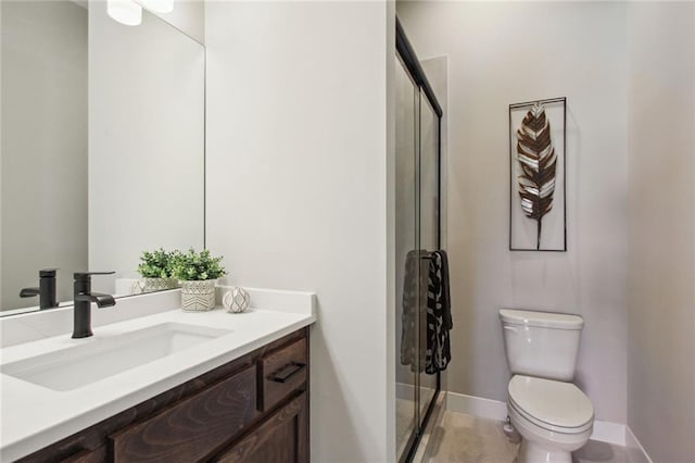 17162 S Heatherwood St, Olathe, KS 66062 - bathroom featuring vanity, a stall shower, and tile patterned flooring