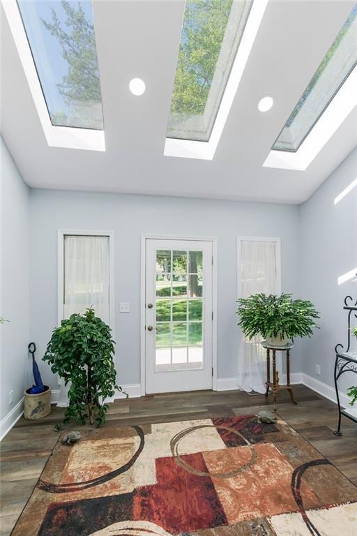 1100 Sycamore Ridge Dr, Lansing, KS 66043 - entrance foyer featuring a skylight, wood finished floors, and recessed lighting