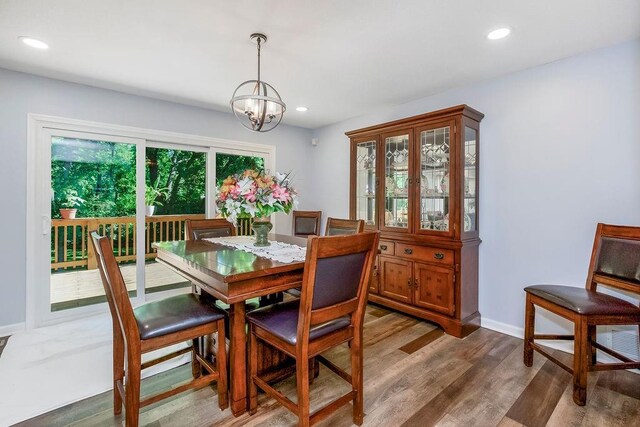 1100 Sycamore Ridge Dr, Lansing, KS 66043 - dining room featuring a chandelier, light wood-style floors, and recessed lighting