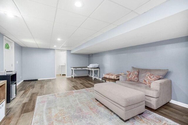 1100 Sycamore Ridge Dr, Lansing, KS 66043 - living area with wood finished floors, recessed lighting, and a paneled ceiling