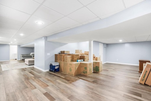 1100 Sycamore Ridge Dr, Lansing, KS 66043 - bar featuring light wood-style flooring, a paneled ceiling, and recessed lighting