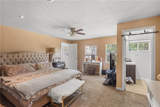 11102 Winchester Ave, Kansas City, MO 64134 - bedroom featuring light carpet, a textured ceiling, and ceiling fan