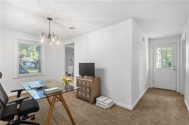 11102 Winchester Ave, Kansas City, MO 64134 - carpeted office space featuring plenty of natural light, a textured ceiling, and a chandelier