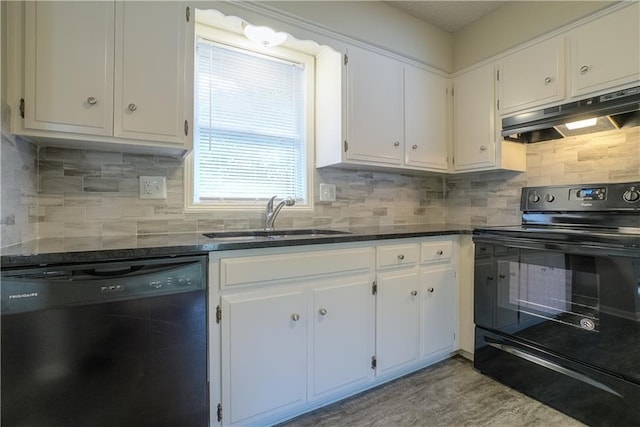 1613 SE Royal St, Oak Grove, MO 64075 - kitchen with black appliances, under cabinet range hood, and white cabinets