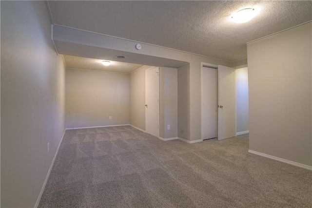 1613 SE Royal St, Oak Grove, MO 64075 - basement featuring carpet flooring and a textured ceiling