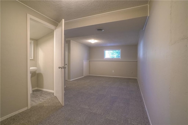 1613 SE Royal St, Oak Grove, MO 64075 - carpeted empty room with a textured ceiling