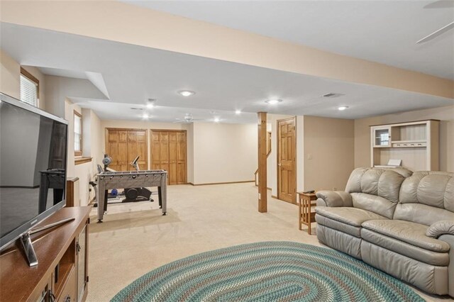 12117 Knox St, Overland Park, KS 66213 - living area featuring light carpet, recessed lighting, and ceiling fan