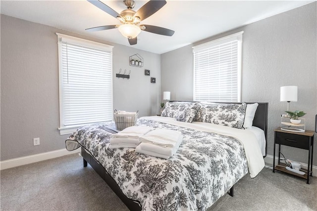 3221 E 11th St, Kansas City, MO 64127 - bedroom featuring carpet flooring, a ceiling fan, and a textured wall