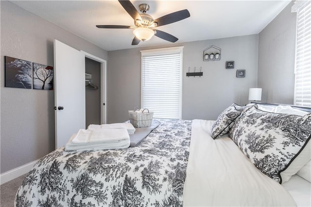 3221 E 11th St, Kansas City, MO 64127 - bedroom featuring carpet flooring and ceiling fan