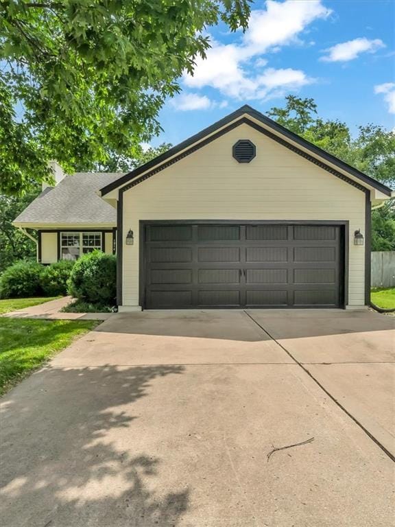 1914 S Leslie Dr, Independence, MO 64055 - single story home featuring driveway, a garage, and a chimney