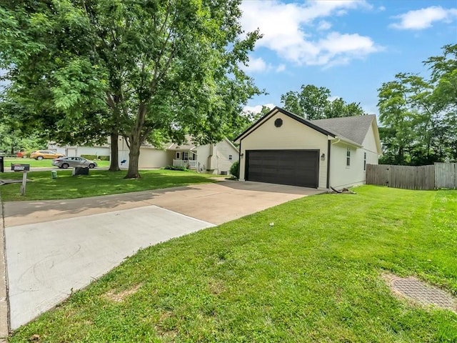 1914 S Leslie Dr, Independence, MO 64055 - ranch-style home with a garage and concrete driveway