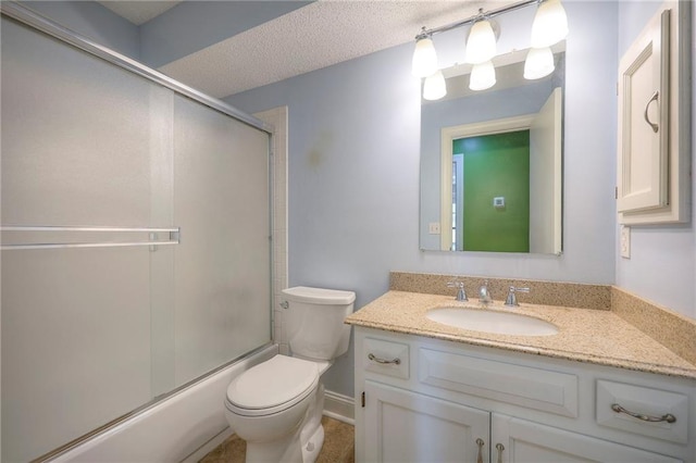12818 W 110th Ter, Overland Park, KS 66210 - bathroom featuring vanity, enclosed tub / shower combo, and a textured ceiling
