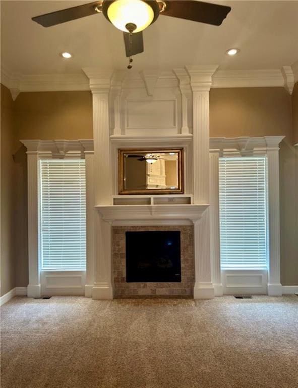 1703 Esther Dr, Kearney, MO 64060 - unfurnished living room with ceiling fan, ornamental molding, a fireplace, carpet, and recessed lighting