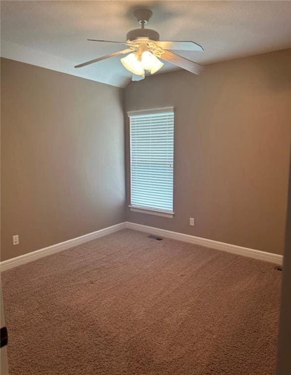 1703 Esther Dr, Kearney, MO 64060 - spare room featuring carpet flooring and a ceiling fan