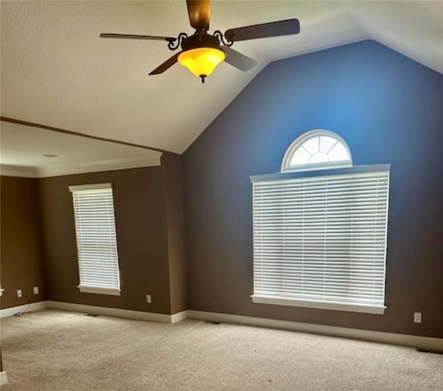 1703 Esther Dr, Kearney, MO 64060 - carpeted empty room featuring ceiling fan and vaulted ceiling