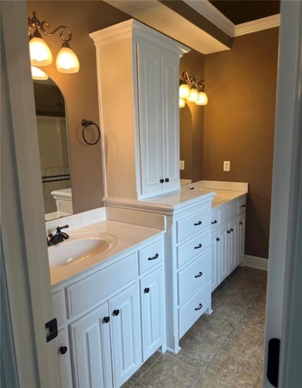 1703 Esther Dr, Kearney, MO 64060 - bathroom featuring vanity, ornamental molding, and tile patterned flooring