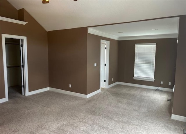 1703 Esther Dr, Kearney, MO 64060 - carpeted spare room featuring a ceiling fan, lofted ceiling, and ornamental molding
