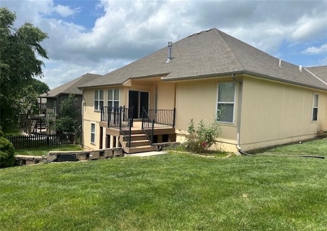 1703 Esther Dr, Kearney, MO 64060 - rear view of house featuring a wooden deck and a shingled roof