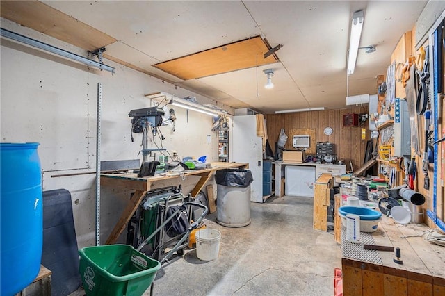 1433 Haskell Rd, Williamsburg, KS 66095 - below grade area with a workshop area and wood walls