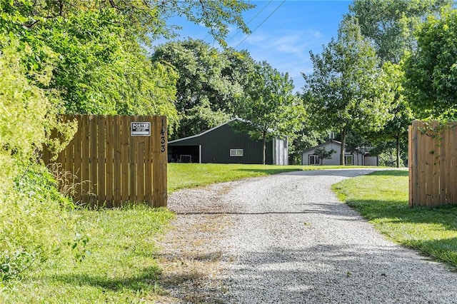 1433 Haskell Rd, Williamsburg, KS 66095 - view of dirt / gravel road with an outbuilding