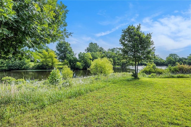 1433 Haskell Rd, Williamsburg, KS 66095 - view of grassy yard featuring a water view