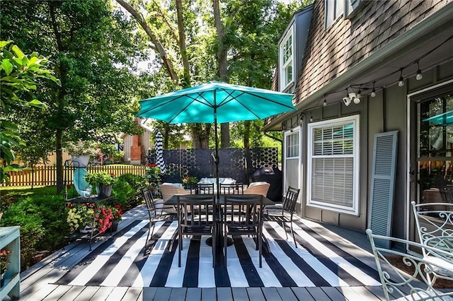 9718 W 115th Ter, Overland Park, KS 66210 - wooden terrace featuring outdoor dining area