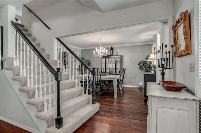 9718 W 115th Ter, Overland Park, KS 66210 - stairs with wood finished floors, a chandelier, and crown molding
