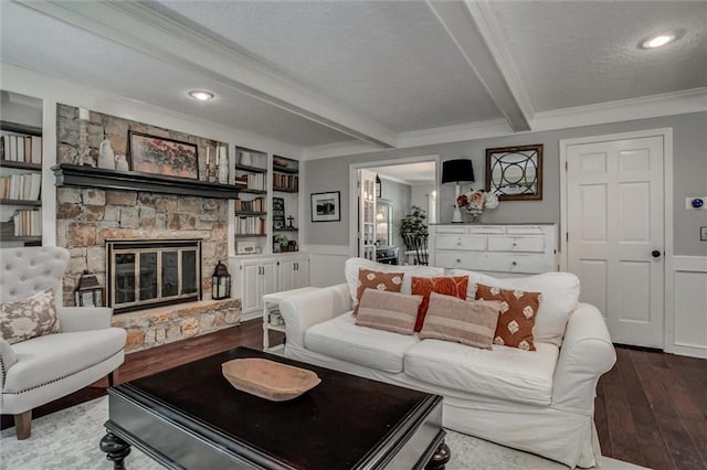 9718 W 115th Ter, Overland Park, KS 66210 - living room with crown molding, dark wood-type flooring, beamed ceiling, a textured ceiling, and a fireplace
