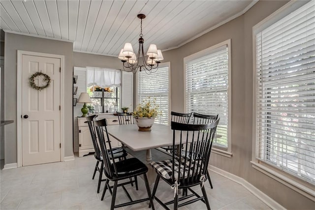 9718 W 115th Ter, Overland Park, KS 66210 - dining area featuring a chandelier, light tile patterned floors, crown molding, and wooden ceiling