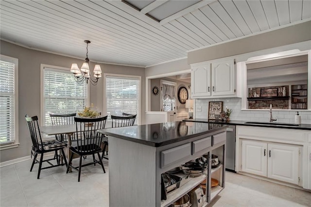 9718 W 115th Ter, Overland Park, KS 66210 - kitchen with dark countertops, white cabinets, light tile patterned floors, open shelves, and ornamental molding