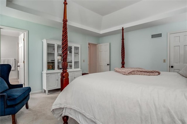 9718 W 115th Ter, Overland Park, KS 66210 - bedroom with light colored carpet and a raised ceiling