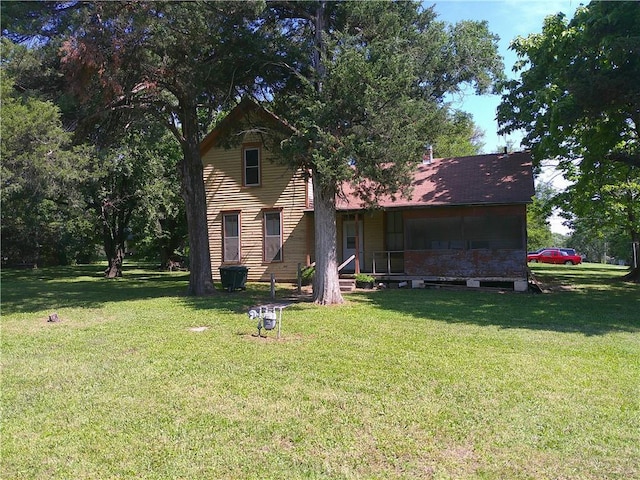 1022 Sycamore St, Humboldt, KS 66748 - back of property featuring a lawn