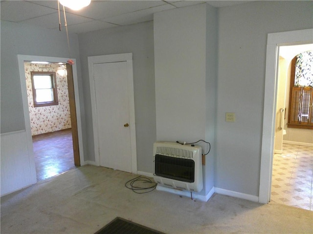1022 Sycamore St, Humboldt, KS 66748 - unfurnished living room with heating unit and carpet
