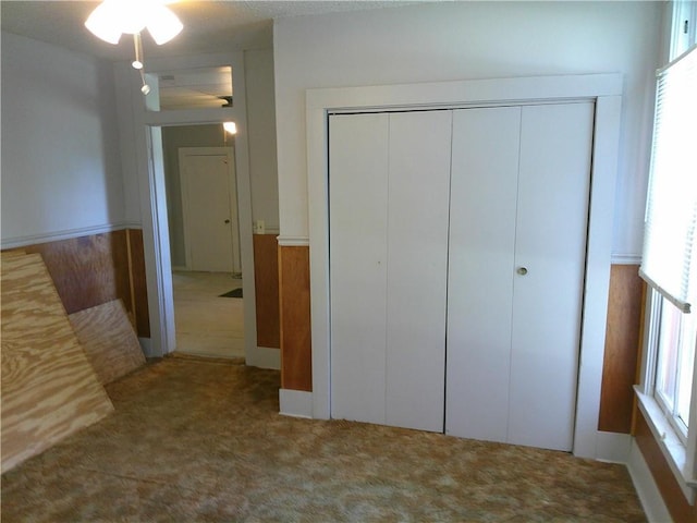 1022 Sycamore St, Humboldt, KS 66748 - unfurnished bedroom with carpet flooring and a closet