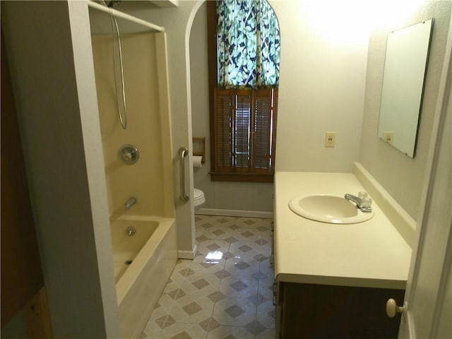 1022 Sycamore St, Humboldt, KS 66748 - full bathroom with vanity, tile patterned flooring, and shower / washtub combination