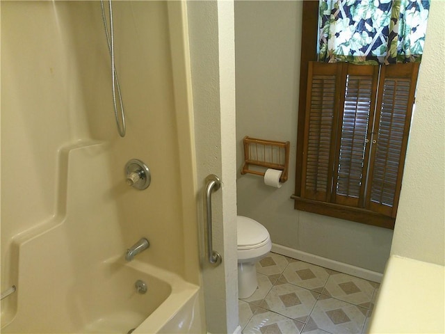 1022 Sycamore St, Humboldt, KS 66748 - full bath featuring tile patterned flooring and shower / bathtub combination