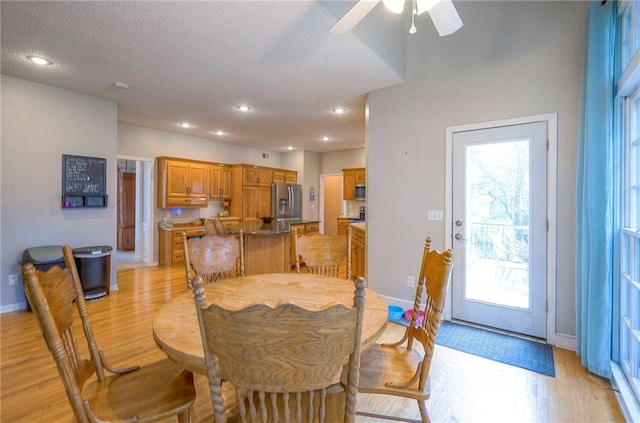11580 S Skyview Ln, Olathe, KS 66061 - dining space with a textured ceiling, light wood-style flooring, ceiling fan, and recessed lighting