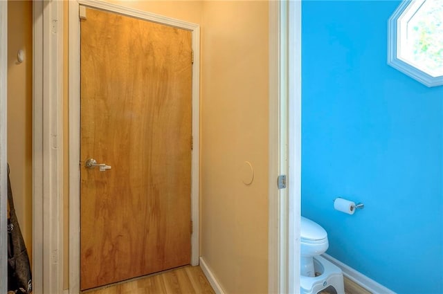 11580 S Skyview Ln, Olathe, KS 66061 - bathroom featuring toilet and wood finished floors
