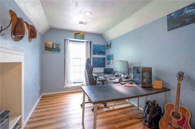 11580 S Skyview Ln, Olathe, KS 66061 - home office featuring vaulted ceiling and wood finished floors