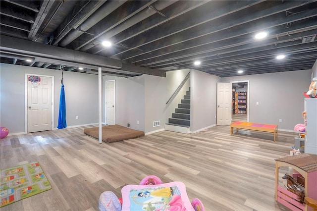 11580 S Skyview Ln, Olathe, KS 66061 - game room with wood finished floors and baseboards