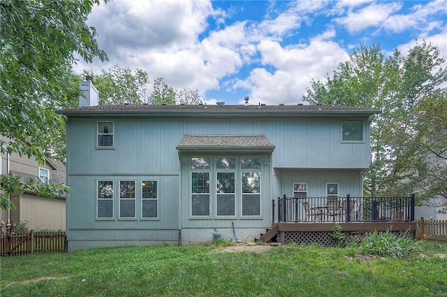 11580 S Skyview Ln, Olathe, KS 66061 - rear view of house featuring a wooden deck and a chimney