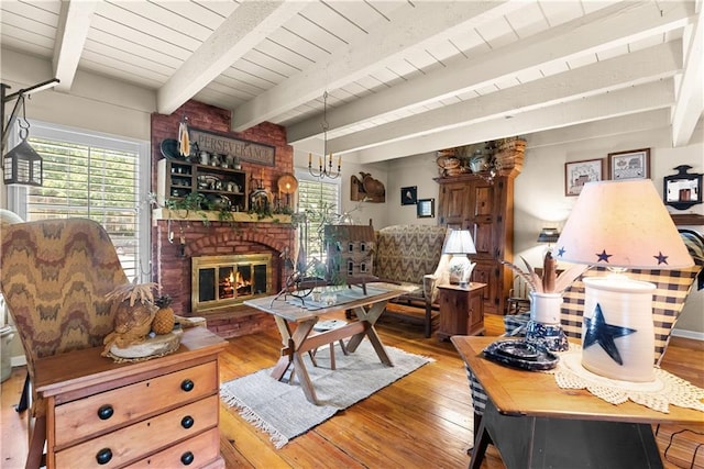 200 NE Oak Tree Cir, Lees Summit, MO 64086 - living area with hardwood / wood-style floors, a brick fireplace, and a wood ceiling with exposed beams