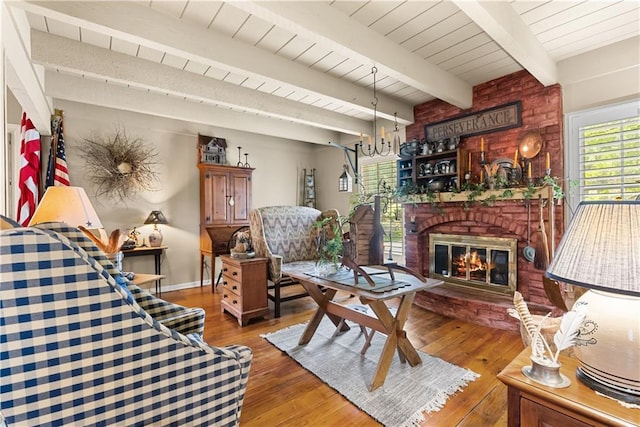 200 NE Oak Tree Cir, Lees Summit, MO 64086 - living room with wood-type flooring, a fireplace, and a wooden ceiling with exposed beams