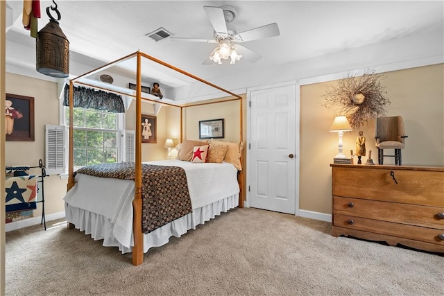 200 NE Oak Tree Cir, Lees Summit, MO 64086 - carpeted bedroom with baseboards and ceiling fan
