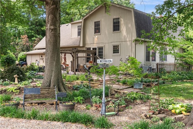 200 NE Oak Tree Cir, Lees Summit, MO 64086 - back of house featuring a shingled roof